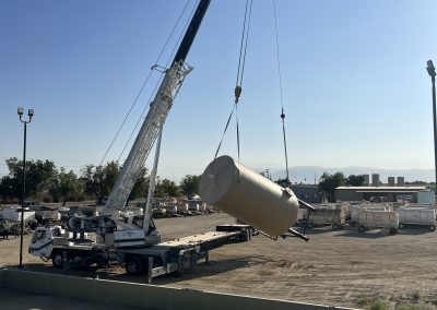 Industrial tank set by crane — heavy construction Bakersfield CA