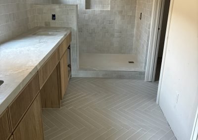 Bathroom tub surround with hex tile — custom tile work Kern County