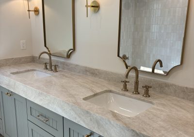 Double vanity with brass mirrors — bathroom remodel Bakersfield CA