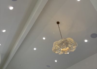Vaulted ceiling great room with chandelier — luxury home remodel Bakersfield CA