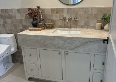 Bathroom vanity with tile backsplash — custom remodel Bakersfield CA