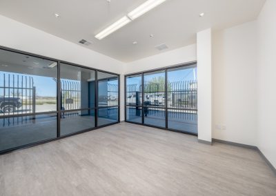 Finished commercial office with glass walls — tenant improvement Kern County CA